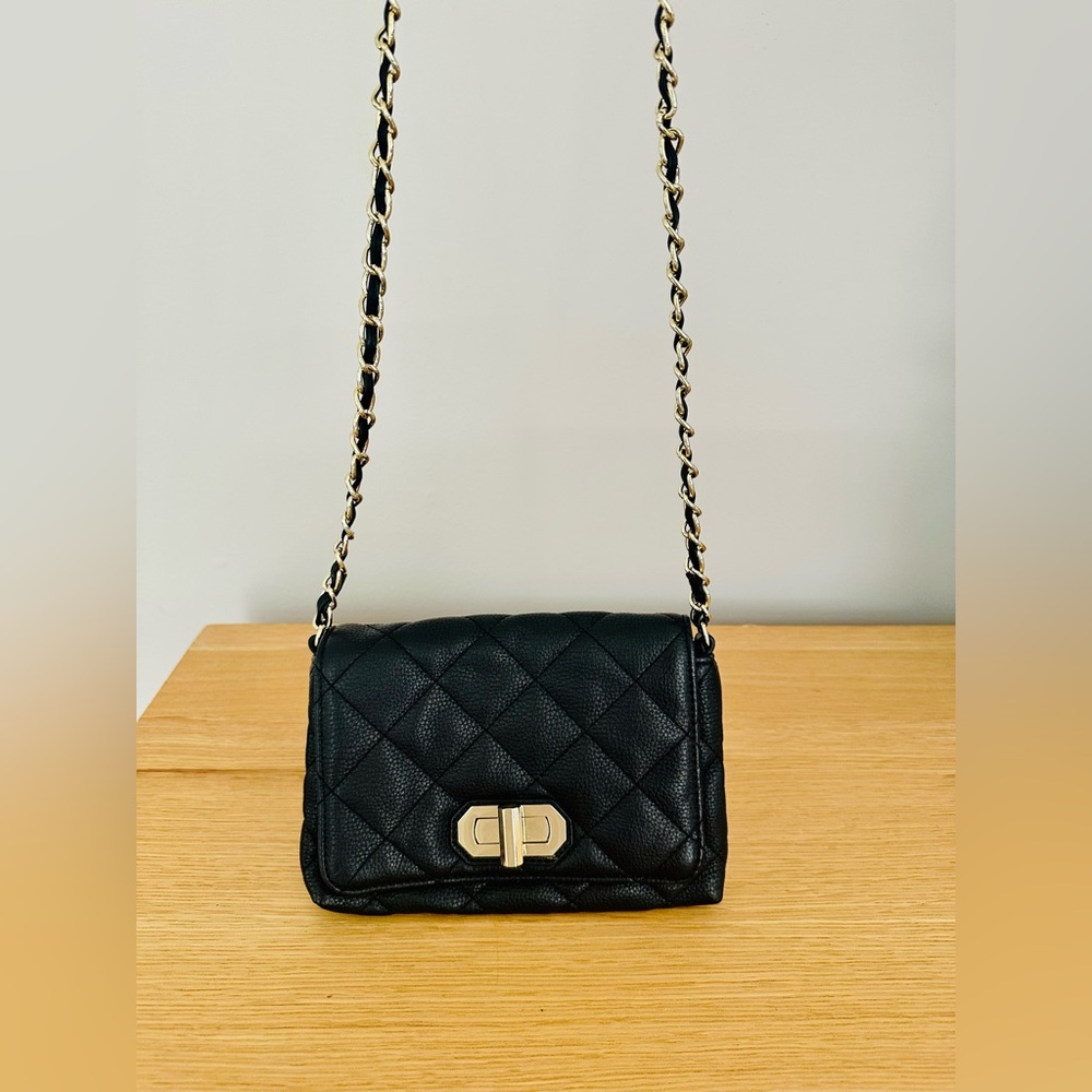 Black quilted gold chain strap crossbody bag